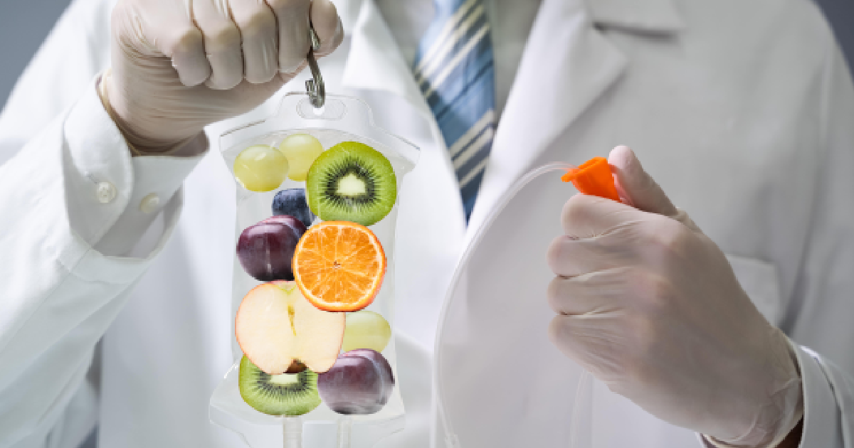 Medical professional holding a nutrient-rich IV bag filled with fruits, symbolizing wellness and IV Therapy in Murrells Inlet, SC