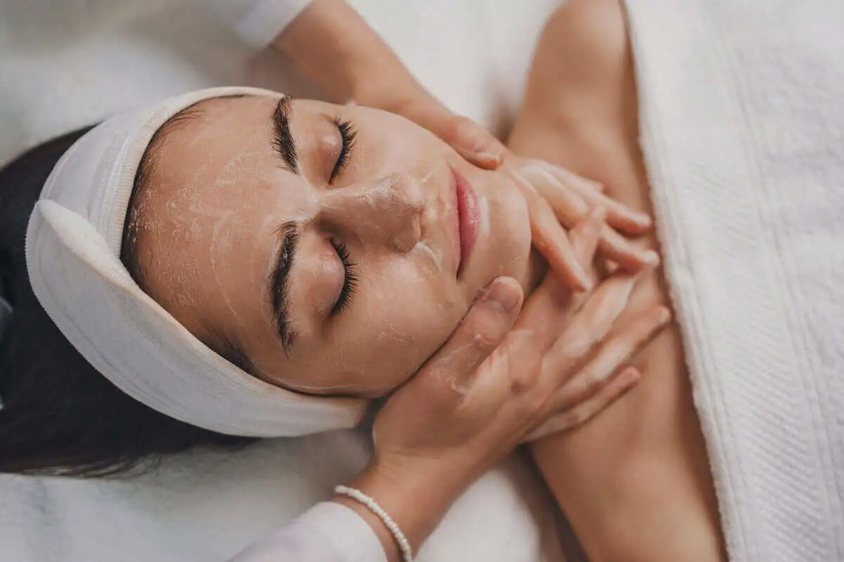 Esthetician performing a professional facial treatment to cleanse and refresh the skin at Posh Aesthetics in Murrells Inlet, SC
